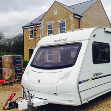 Touring caravan on site.